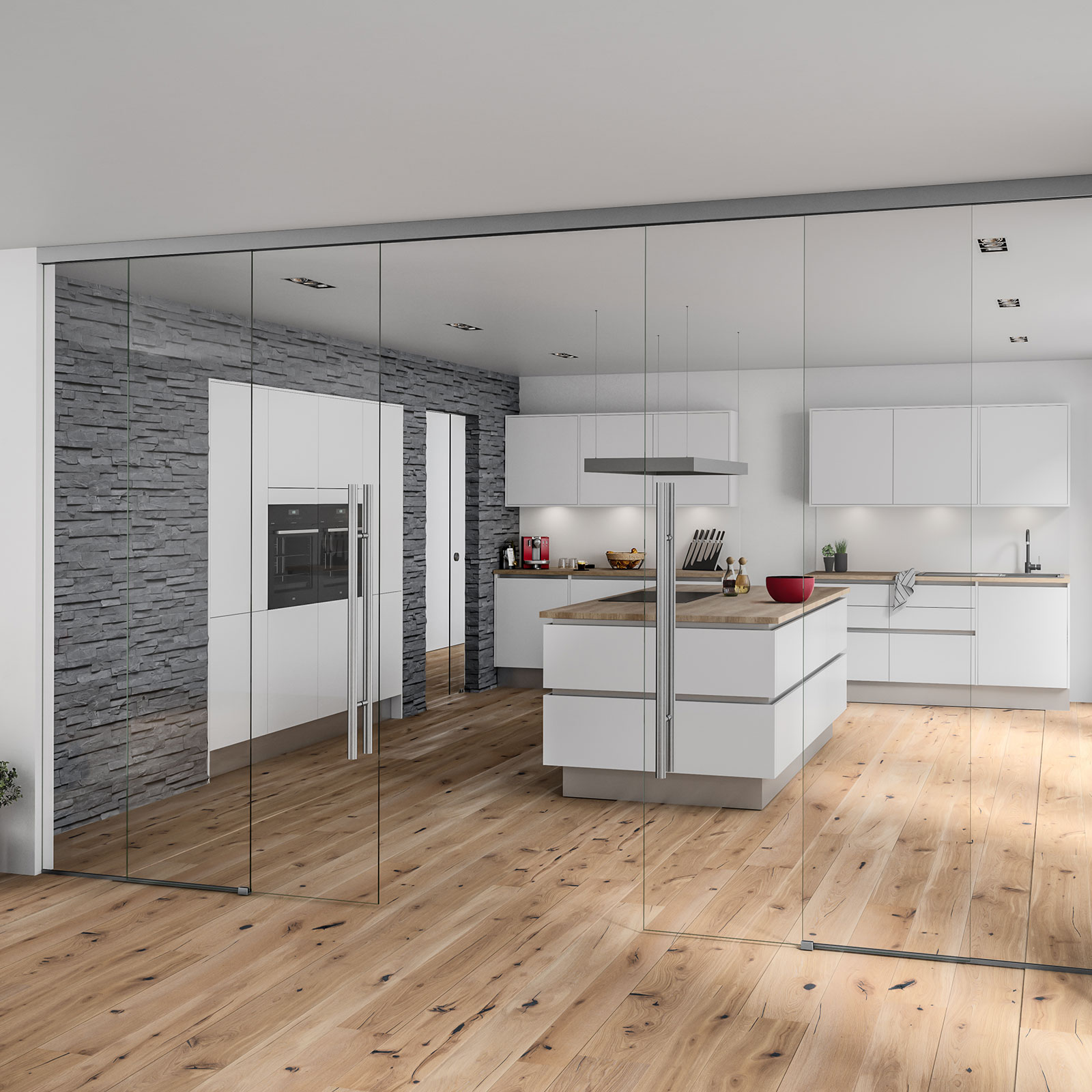 Eine helle und gräumige Küche wird durch eine große Glasfront vom Rest der Wohnung getrennt.
